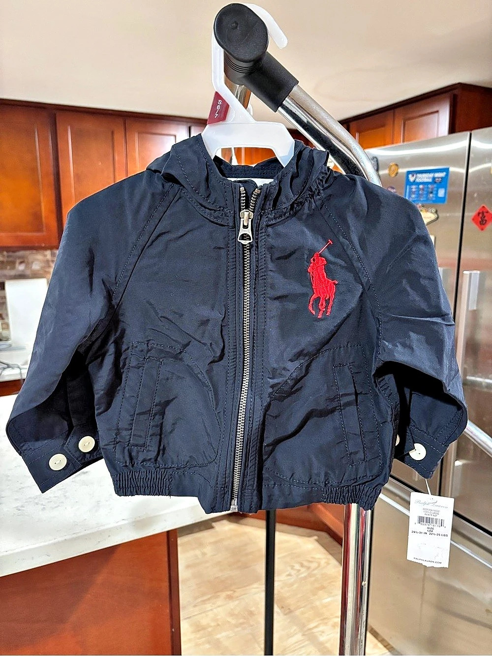 Brand new with tags Ralph Lauren baby hooded jacket in classic navy blue size12M